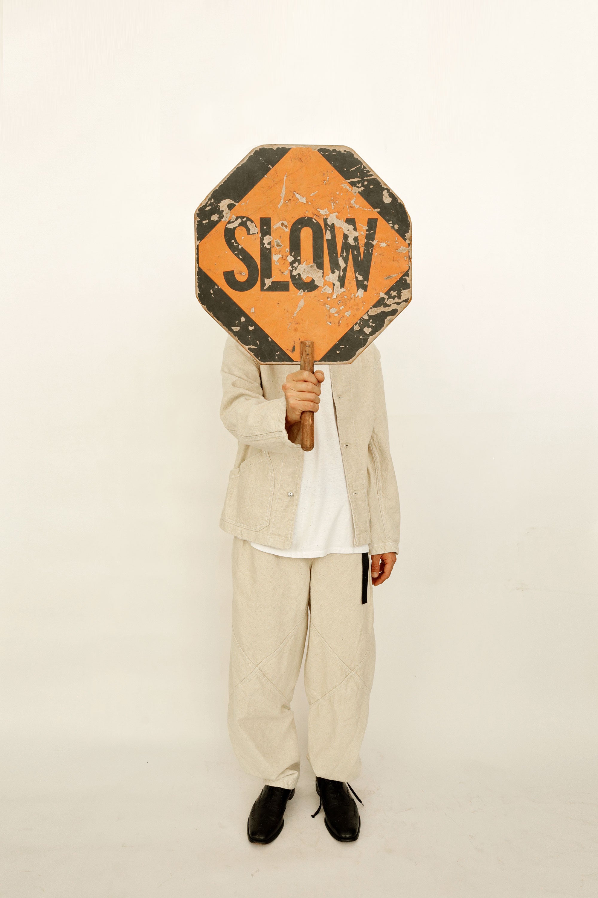 Handheld SLOW/STOP Traffic Sign — Undated